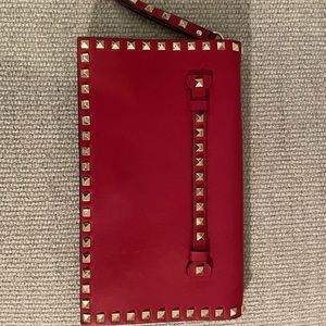 VALENTINO
Nappa Rockstud Wristlet Clutch Red